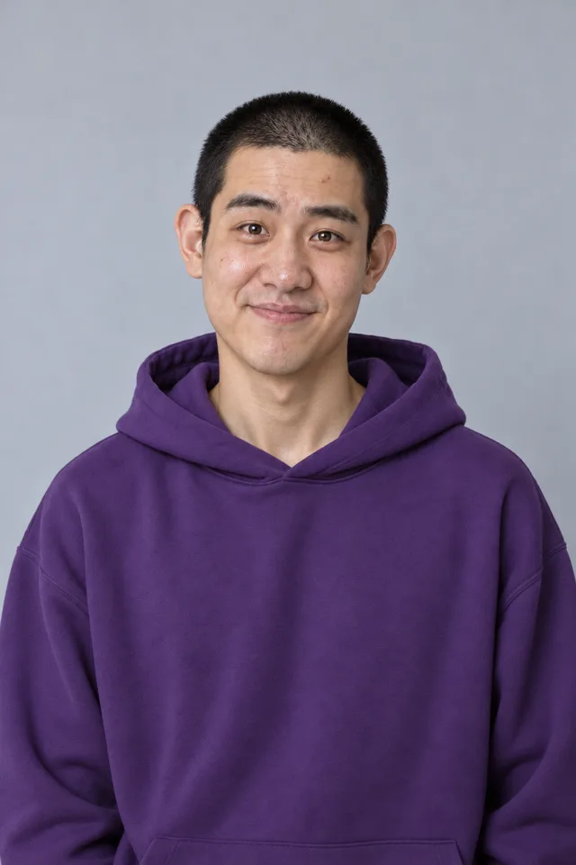 AI-generated example photo: young man with a buzz cut in a purple hoodie against a light gray background